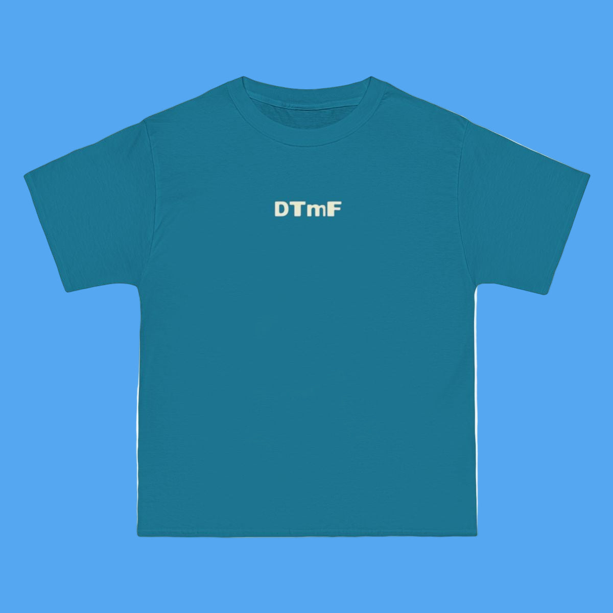 Blue t-shirt with 'DTmF' text on a white background