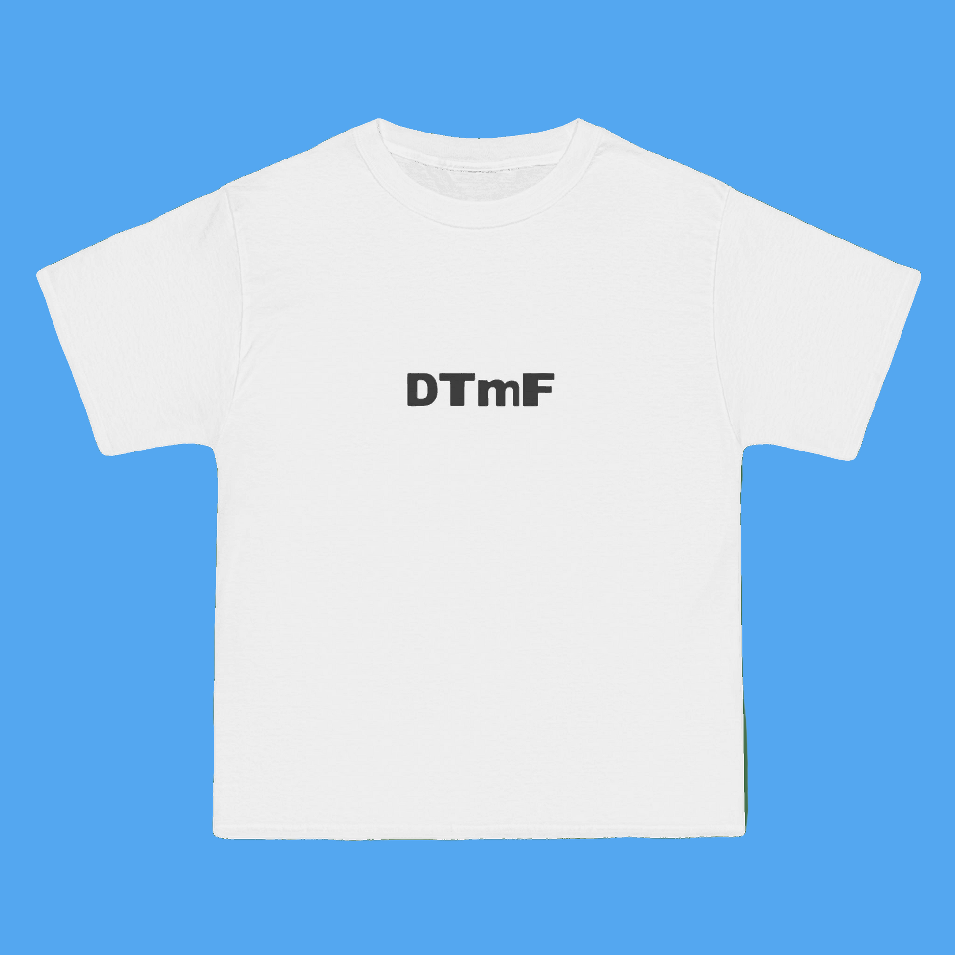 White t-shirt with 'DTmF' text on a green background