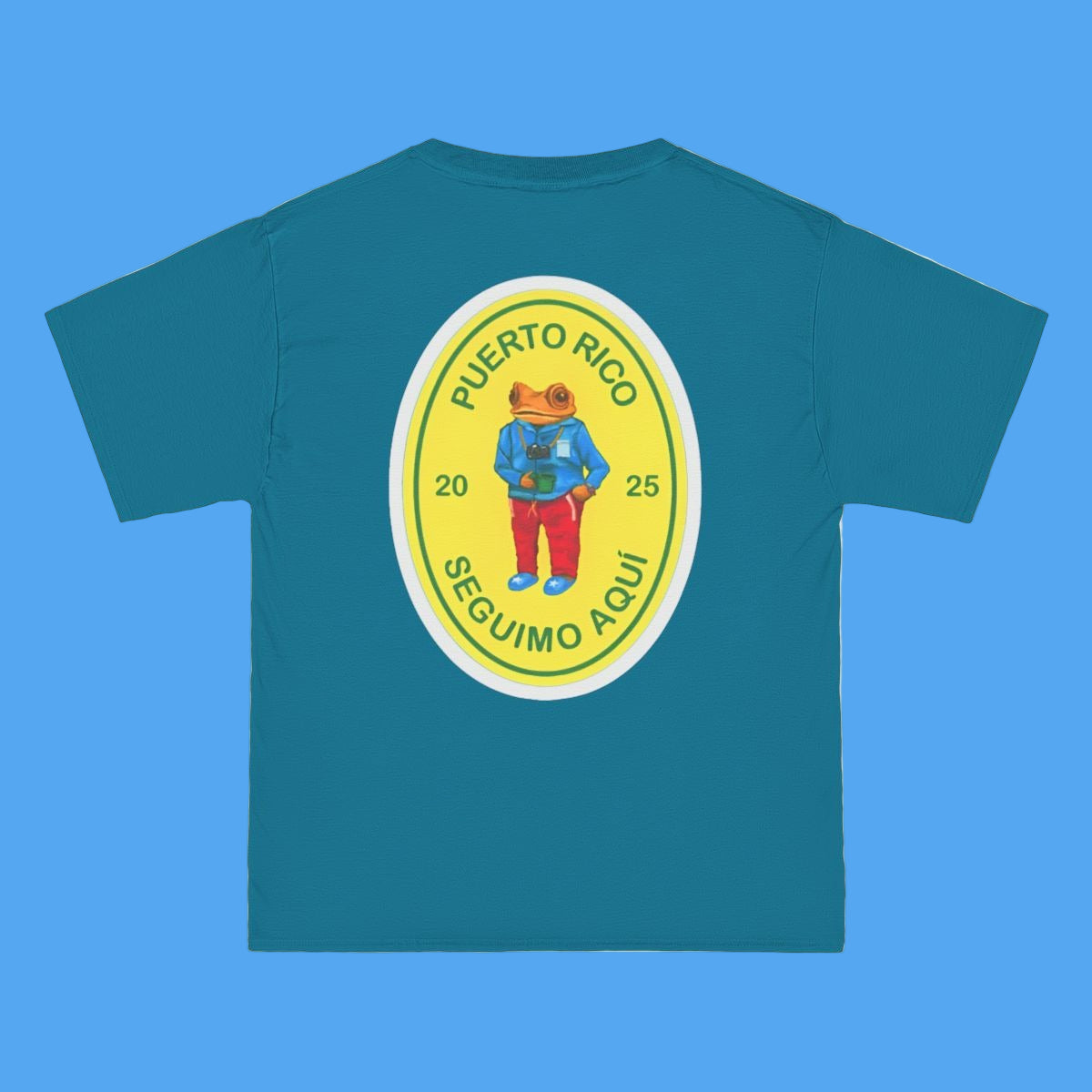 Teal t-shirt with a colorful graphic on the back featuring text and a character.